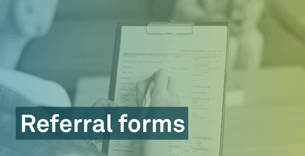 A person filled out a form on a clipboard. Overlaid is text that reads: "Referral Forms".