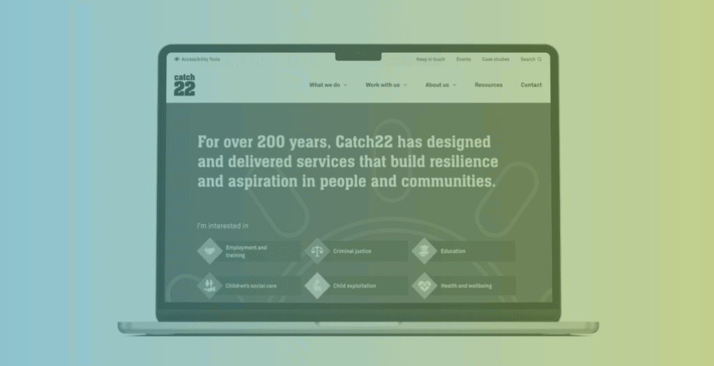 A laptop showing the front page of the Catch22 website.